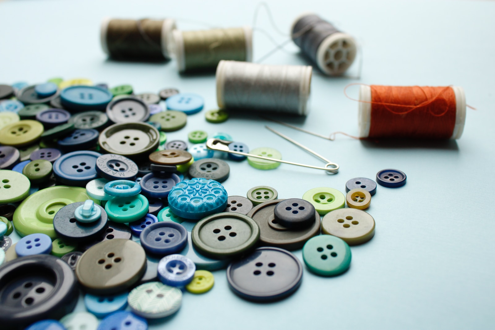 blue and white buttons with blue and red buttons